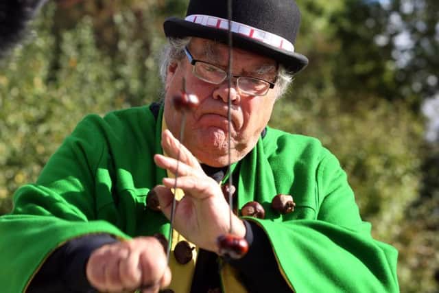 Action from a previous conker championship.