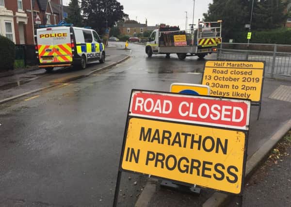 Police in Alexandra Road, Peterborough, where a man was seen acting suspiciously.  The Great Eastern Run was cancelled because of this incident. Picture: David Lowndes