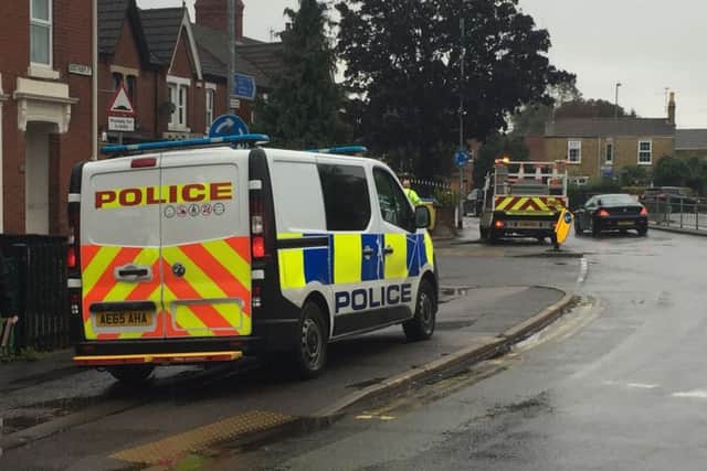 Police in Alexandra Road on Sunday