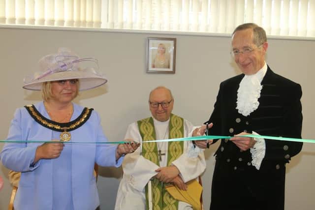 Cllr Julie Windle and High Sheriff Neil McKittrick cut the ribbon, with Retired Bishop of Huntingdon John Flack. Photo: RWT Photography