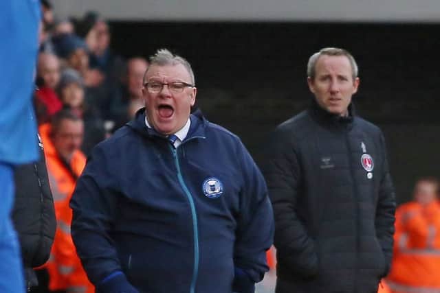 Steve Evans shouting instructions.