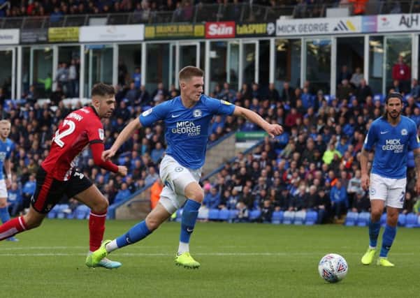 On-loan Posh star Josh Knight could change positions at Gillingham.