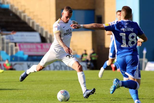 Joe Ward of Peterborough United scores the opening goal of the game at Gillingham. Photo: Joe Dent/theposh.com