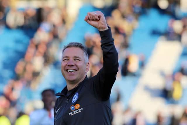 Posh boss Darren Ferguson celebrates the win in his 400th game in charge at Gillingham. Photo: Joe Dent/theposh.com.