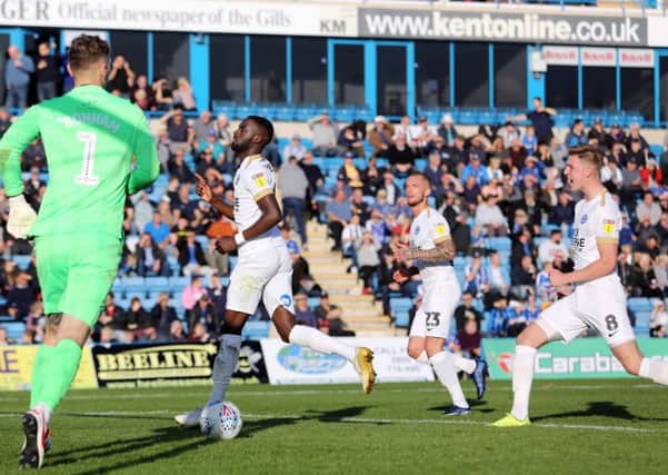Mo Eisa celebrates after scoring for Posh from the penalty spot at Gillingham. Photo: Joe Dent/theposh.com.