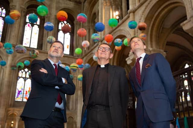 Andy Fawkes, managing director of Masteroast, Matthew Mills, commercial director of Masteroast, and The Very Revd Chris Dalliston
, Dean of Peterborough, at the cathedral. Photo: Terry Harris