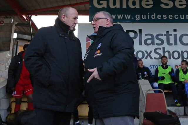 Accrington manager John Coleman (left) with former Posh boss Steve Evans last season.