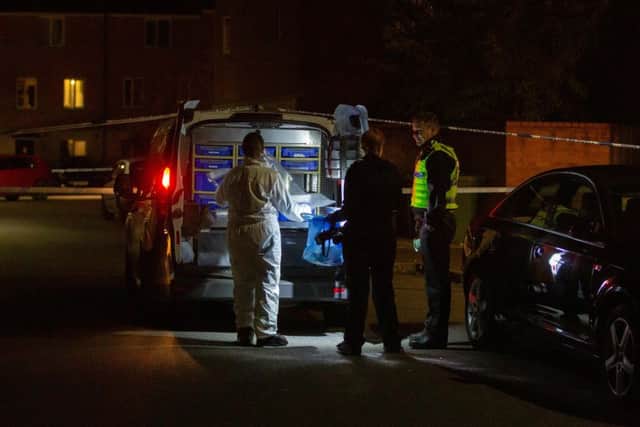 Police at the crime scene: Picture by Terry Harris. THA