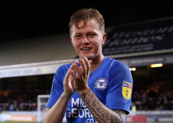 Frankie Kent of Peterborough United is all smiles at full-time. Photo: Joe Dent/theposh.com