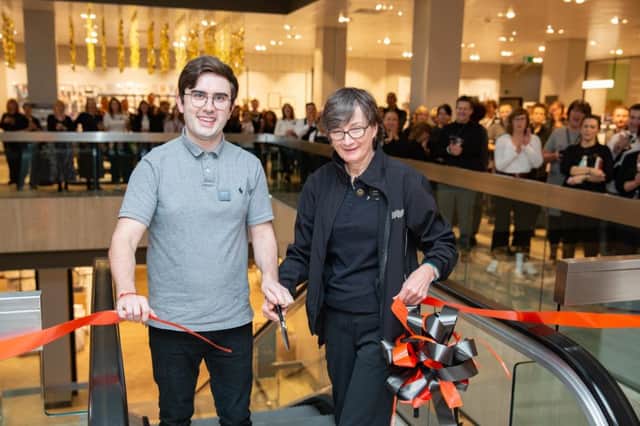 Daevid Mcakie and Julie Nolan cut the ribbon opening the new floor at John Lewis.  Queensgate, Peterborough Thursday 24 October 2019.  Picture by Terry Harris. THA