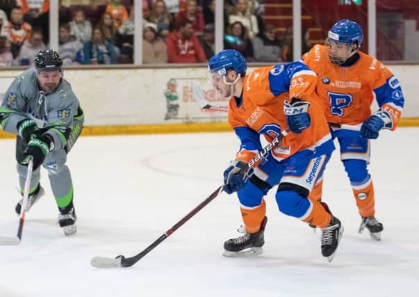 Nathan Long carries the puck out of defence for Phantoms im the home game with Hull. Photo: Tom Scott.
