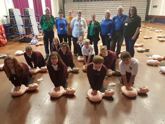 Sir Harry Smith pupils performing CPR