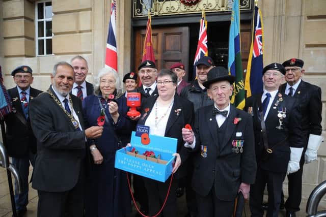 Royal British Legion Poppy Appeal launch in the City Centre.  Langford Smith , Mayor of Peterborough Coun. Gul Nawaz and appeal organisers EMN-191027-095424009