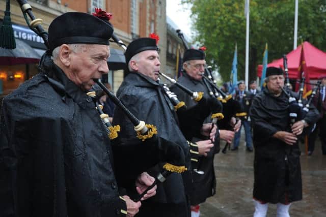 Royal British Legion Poppy Appeal launch in the City Centre. Playing, members of the Peterborough Highland Pipe Band EMN-191027-095413009