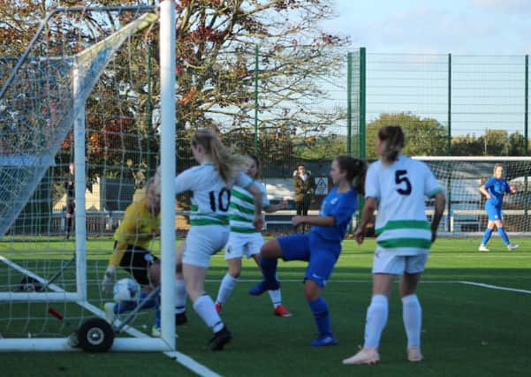The controversial New Saints (hoops) goal against Posh in the FA Women's Cup. Photo: Gary Reed.