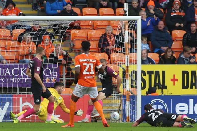 Armand Gnanduillet of Blackpool scores his sides second goal of the game against Posh. Photo: Joe Dent/theposh.com.