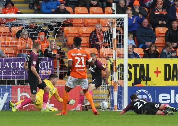 Armand Gnanduillet of Blackpool scores his sides second goal of the game against Posh. Photo: Joe Dent/theposh.com.