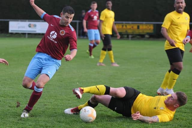 FA Vase action from Deeping Rangers v Stanway Rovers (yellow). Photo: David Lowndes.