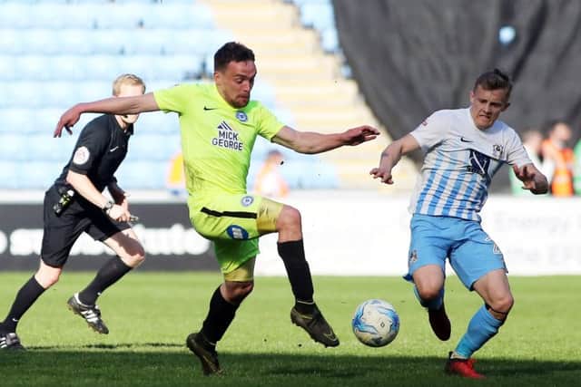 Paul Taylor in action for Posh.