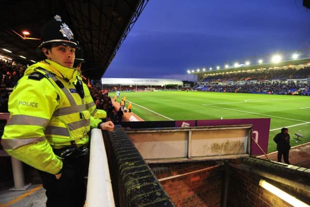 Police officers on duty at a Peterborough United match