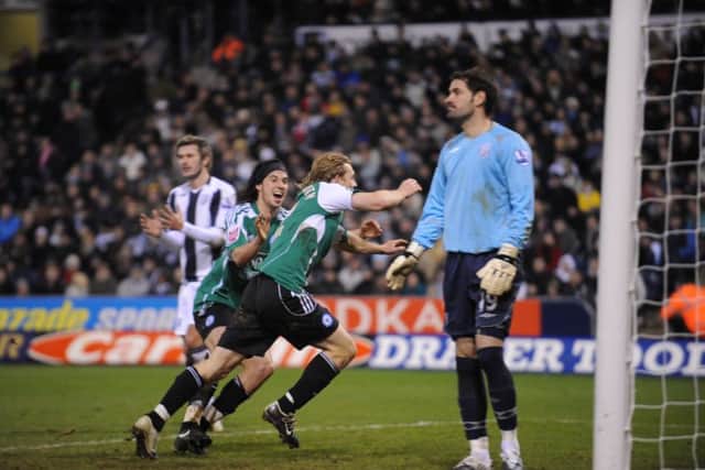 Craig Mackail-Smith celebates an FA Cup goal for Posh at West Brom.