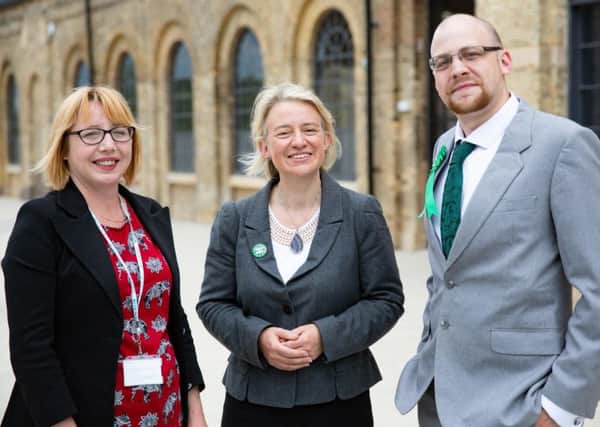 Former Green Party leader Natalie Bennett (centre) with candidates Nicola Day and Joseph Wells at Fletton Quays in Peterborough
