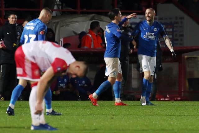Marcus Maddison of Peterborough United celebrates his goal at Stevenage. Photo: Joe Dent/theposh.com.