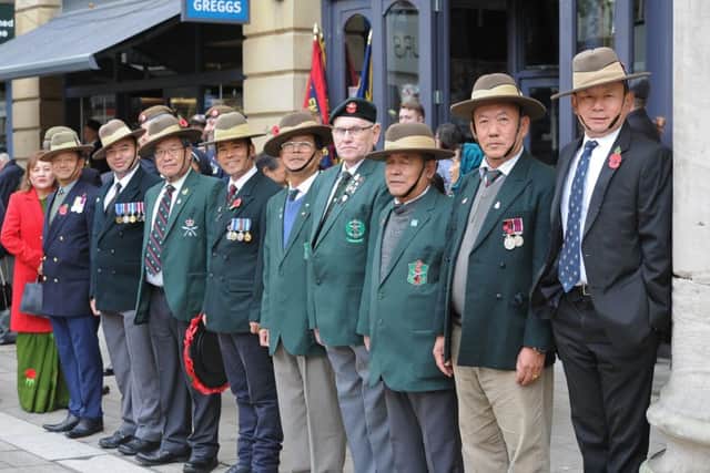 Remembrance Sunday in Peterborough City Centre.  The  Gurkas on parade EMN-191011-212200009