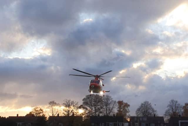 The Magpas air ambulance at the scene. Photo: David Chandler