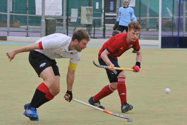 Ross Ambler (red) scored for City of Peterborough against Loughborough Students