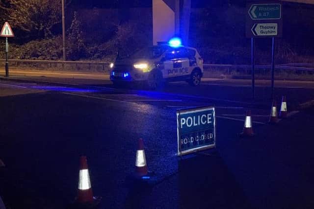 Police at the scene of the road closure. Photo: Cambridgeshire police