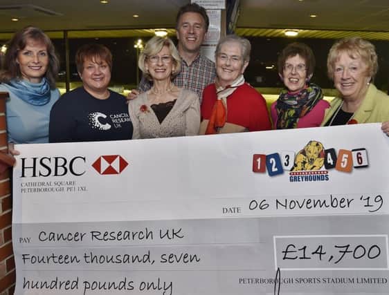 Jackie Perkins, Jo Marriott, Maggie Perkins, Richard Perkins, Judith Wojtowicz and Audrey Scotney  at pres of cheque for £14,700 from the Peterborough Greyhound Stadium to Cancer Research UK EMN-190711-122948009