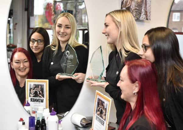 PT Salon of the Year competition winner Kirsty's Hair and Beauty at Welland Road.  Kirsty Brown with  Maimoona Bibi and Khala Brown with the award. EMN-191211-123711009