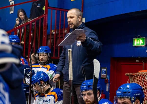 Phantoms coach Slava Koulikov addresses his troops.