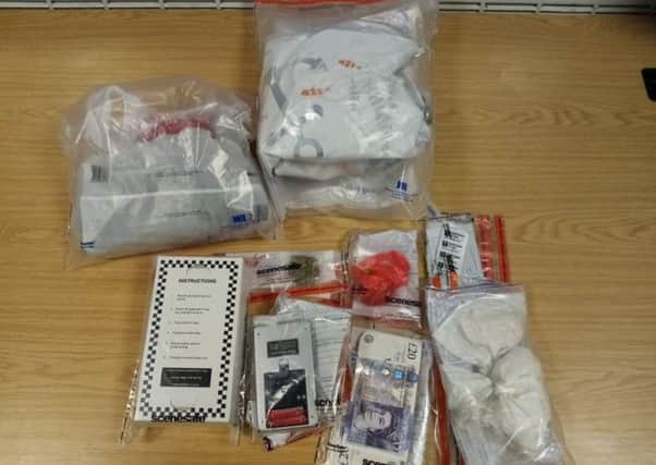 Drugs and cash which were seized by police. Photo: Cambridgeshire police