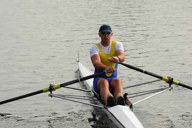 A Peterborough City Rowing Club member in action at Thorpe Meadows. Photo: Alan Storer