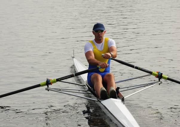 A Peterborough City Rowing Club member in action at Thorpe Meadows. Photo: Alan Storer