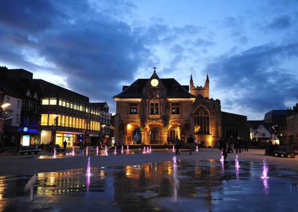 Peterborough's Cathedral Square at dusk with the fountains lit up. Photo: David Lowndes/Peterborough Telegraph
