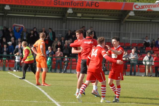 Stamford AFC celebrate beating Witton Albion on  the final day of the season to avoid relegation. Photo: John Evely EMN-150425-180629001