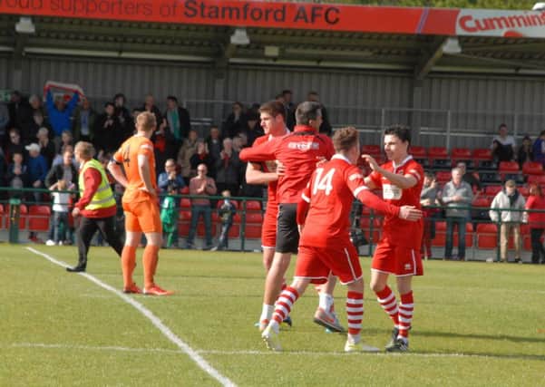 Stamford AFC celebrate beating Witton Albion on  the final day of the season to avoid relegation. Photo: John Evely EMN-150425-180629001