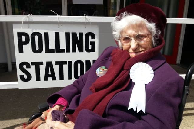 104 year-old Eunice 'Betty' Knight outside the polling station in Boston.