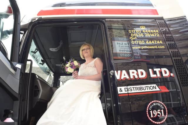 Sarah Farrington, Brett Baines wedding at Stamford register Office. The bride arrived in a Lorry Cab EMN-150905-181052009