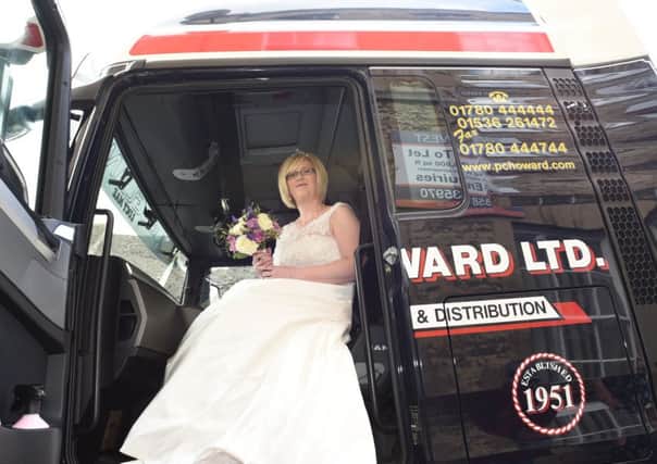 Sarah Farrington, Brett Baines wedding at Stamford register Office. The bride arrived in a Lorry Cab EMN-150905-181052009