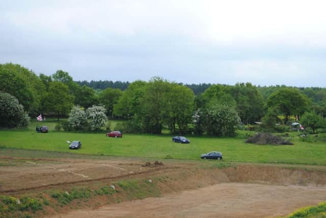Cars abandoned near the rave site at Twyford Wood