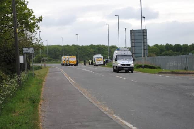 A heavy police presence around Twyford Wood