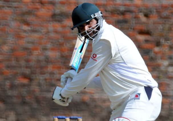 Ajaz Akhtar on his way to 71 for Market Deeping at Spalding.