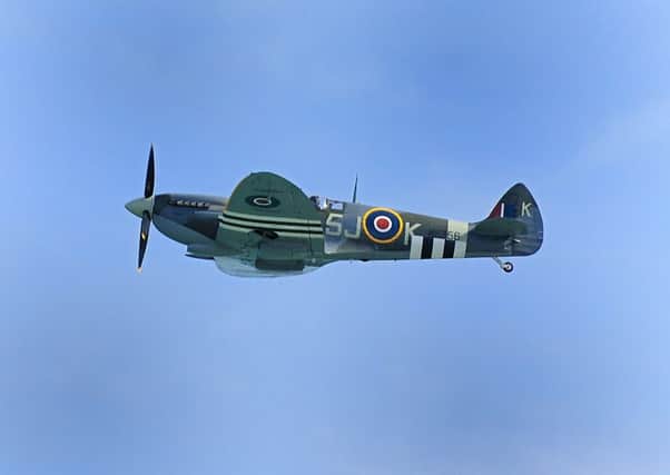 Battle of Britain Memorial Flight, Pelham Place, Hastings.07.06.14.Pictures by: TONY COOMBES PHOTOGRAPHYSpitfire over Hastings Seafront SUS-140906-080909001
