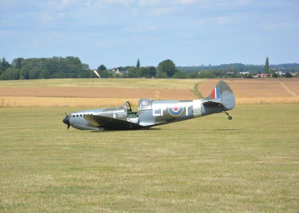 Emergency services were called to Sibson Airfield after a spitfire was forced to make an emergency landing. Photo: Photofolio EMN-150718-135611001