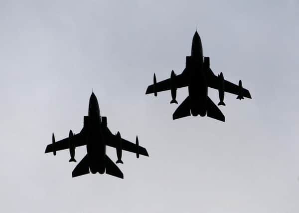 Two RAF Tornado GR4 jets, as the RAF Tornado squadron spearheading Britain's air campaign against Islamic State (IS) forces in Iraq has been given a second stay of execution. Photo: PA