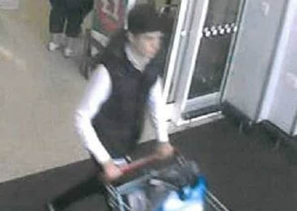 The man police want to speak to about the theft of items from Sainsbury's in Bourne on June 29. Crime reference 15000053910. EMN-150817-110818001